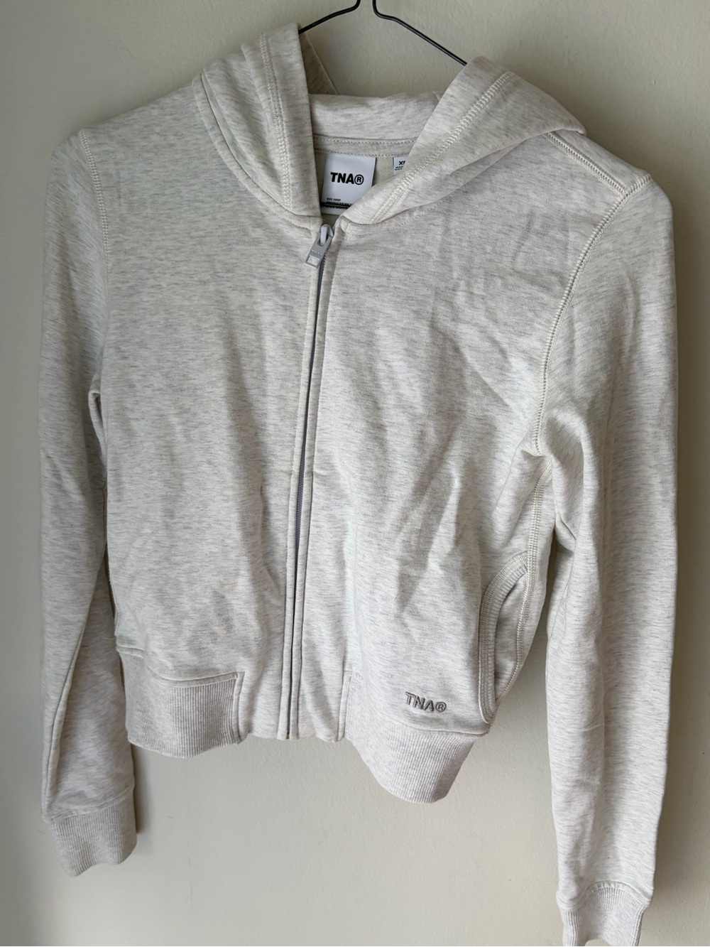 71. Size XS TNA Heathered Cream/Grey Zip-Up Hoodie
